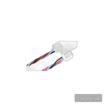 Angled detail of twisted multicolor cable leads and white plastic connectors
