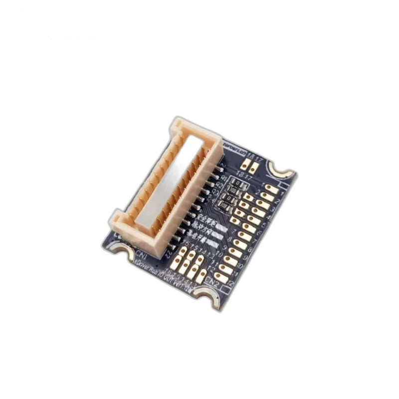 ZeroErr I-O adapter board shown at an angle with a beige multi-pin connector and exposed solder pads.